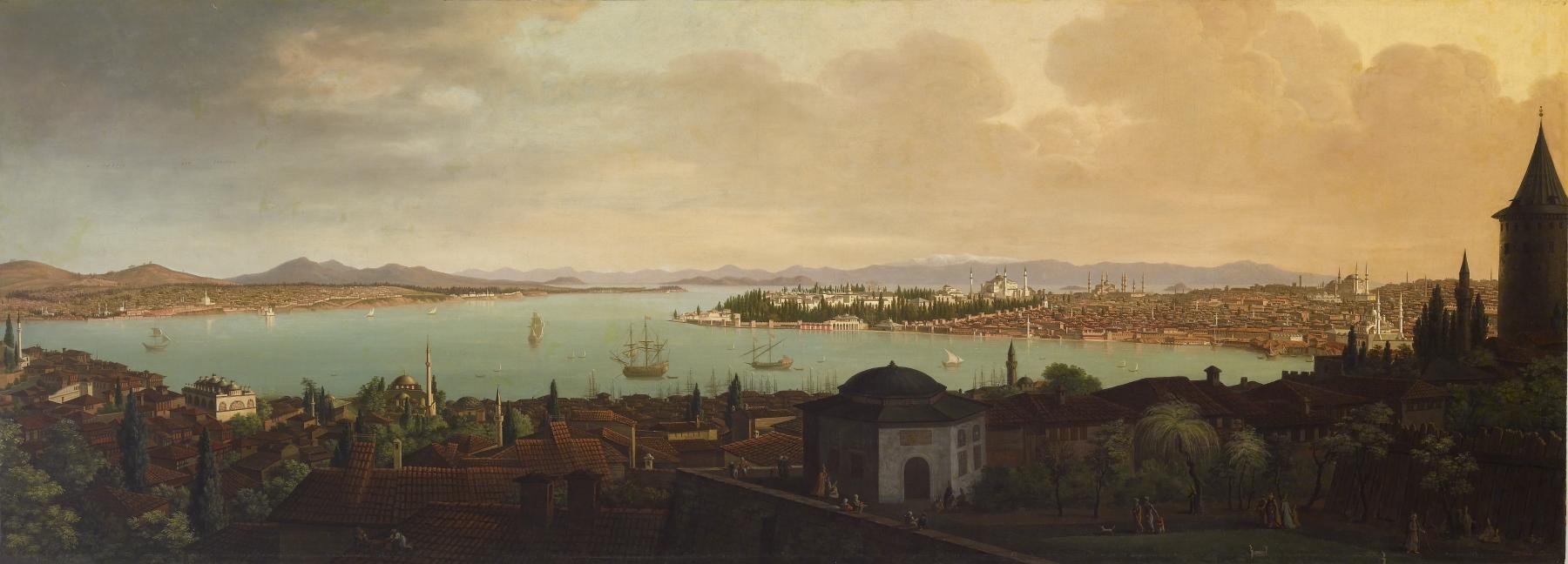 A wide landscape view of a city overlooking its harbour